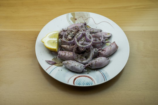 fried calamari with lemon and oregano